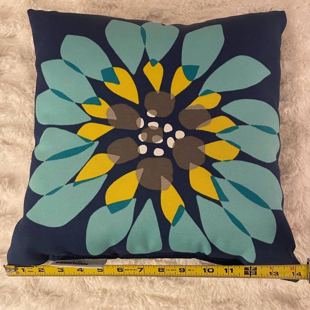 Decorative artsy flower pillow.
